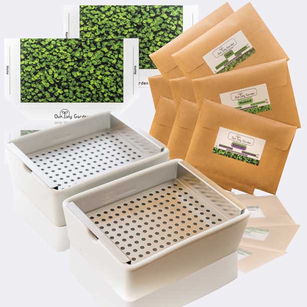 Two microgreen grow kits with 8 seed pads